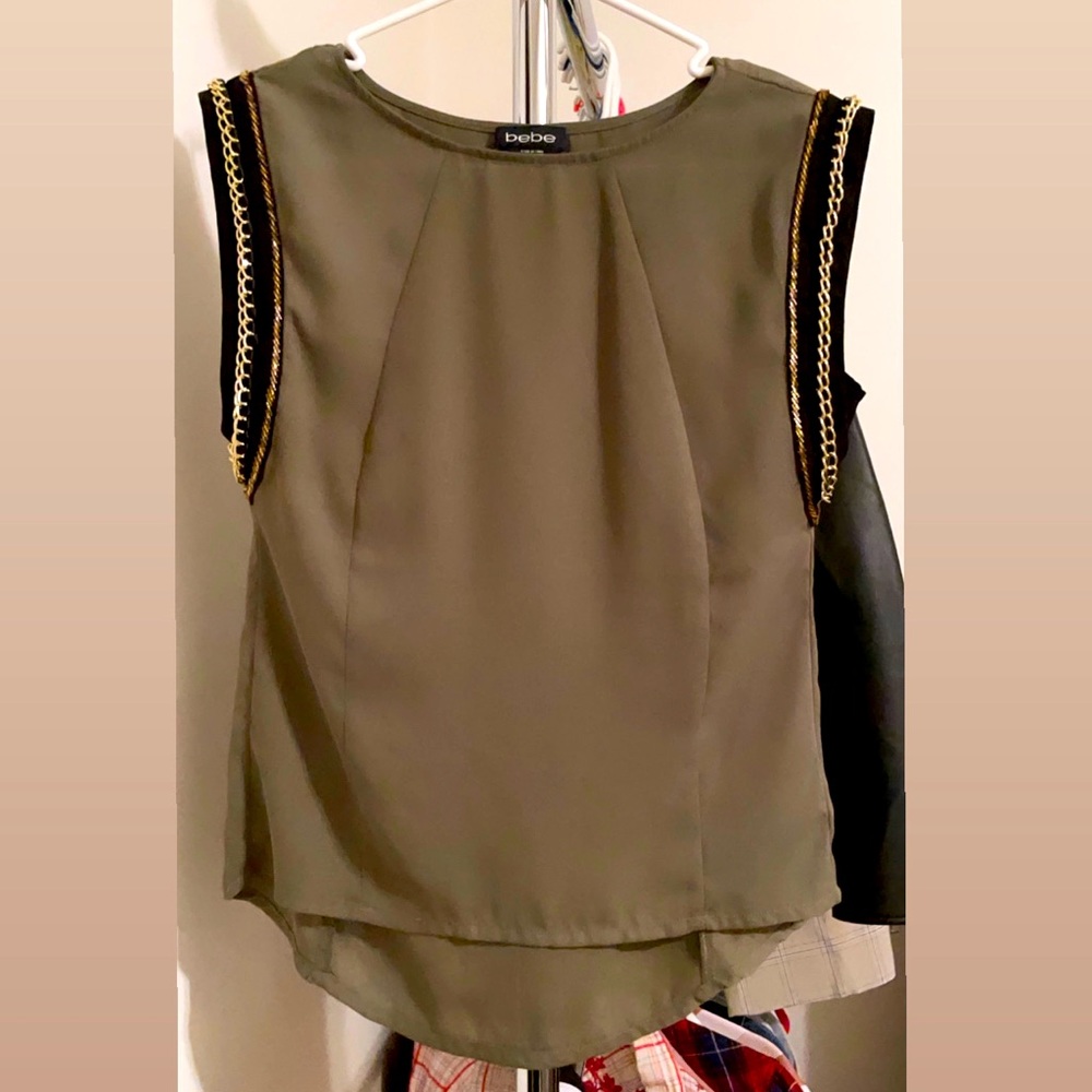 Bebe tank top, golden armor on sleeves